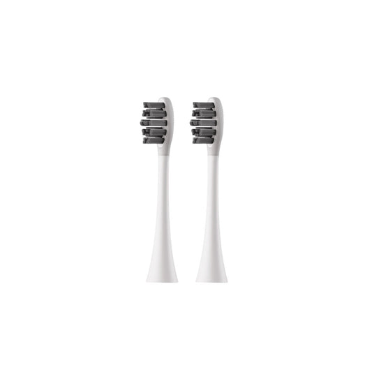 Two white toothbrush heads with black bristles on a white background