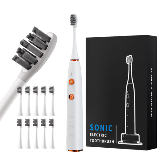 Sonic electric toothbrush with packaging and brush heads on a white background