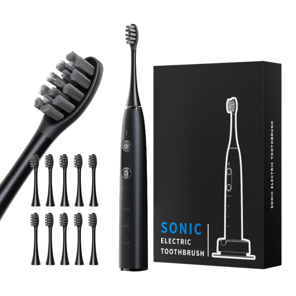 Black sonic electric toothbrush set with additional brush heads and packaging on a white background