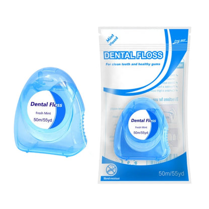 Dental floss package with blue container on a white background