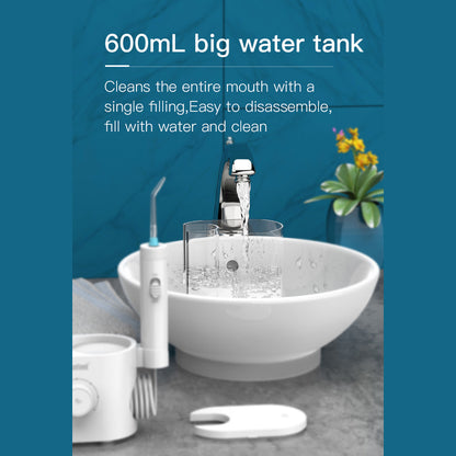 Nicefeel white countertop dental water flosser with a 600mL water tank on a blue background.