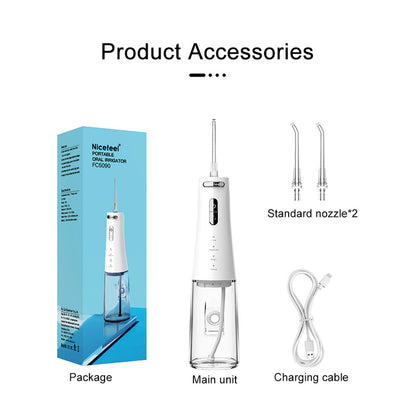 Nicefeel FC5090 portable flosser unboxing image: flosser, 2 nozzles, charging cable, and packaging box.
