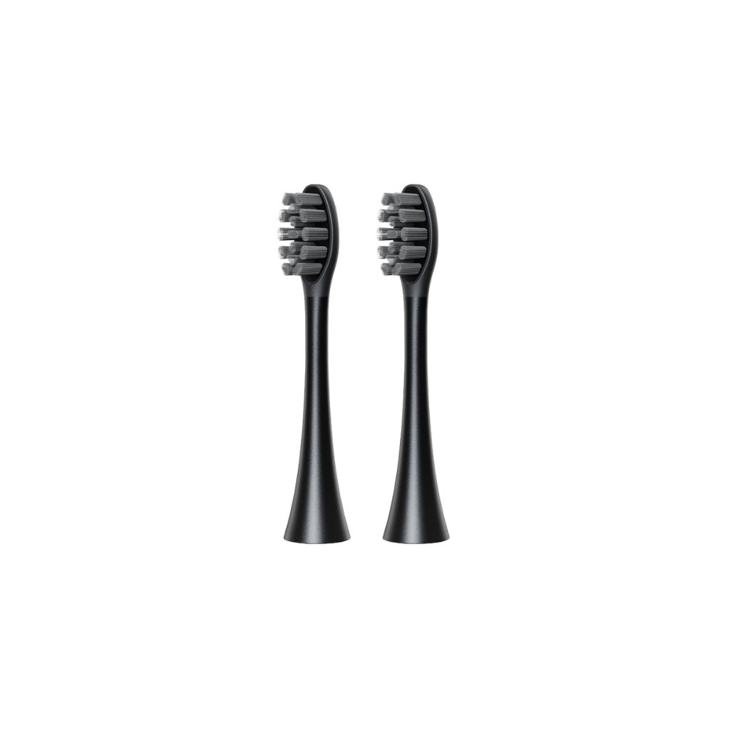 Two black toothbrush heads with bristles on a white background
